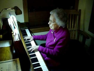 100 year old playing piano