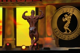Cory Mathews posing at Arnold Classic 212