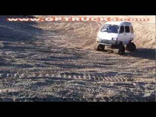 Japanese 4x4 mini van with ATV tracks