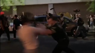 NYPD officer who pushed protester to ground charged with assault